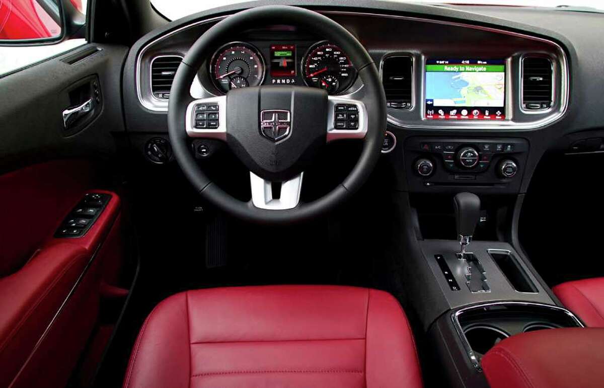 The interior of a 2012 Dodge Charger, in an undated handout photo. The Charger's once-dreary interior has been stylishly upgraded. (Chrysler Group via The New York Times) -- NO SALES; FOR EDITORIAL USE ONLY WITH STORY SLUGGED AUTOS DODGE CHARGER ADV12 BY EZRA DYER. ALL OTHER USE PROHIBITED. - PHOTOS MOVED IN ADVANCE AND NOT FOR USE - ONLINE OR IN PRINT - BEFORE FEB. 12, 2012.