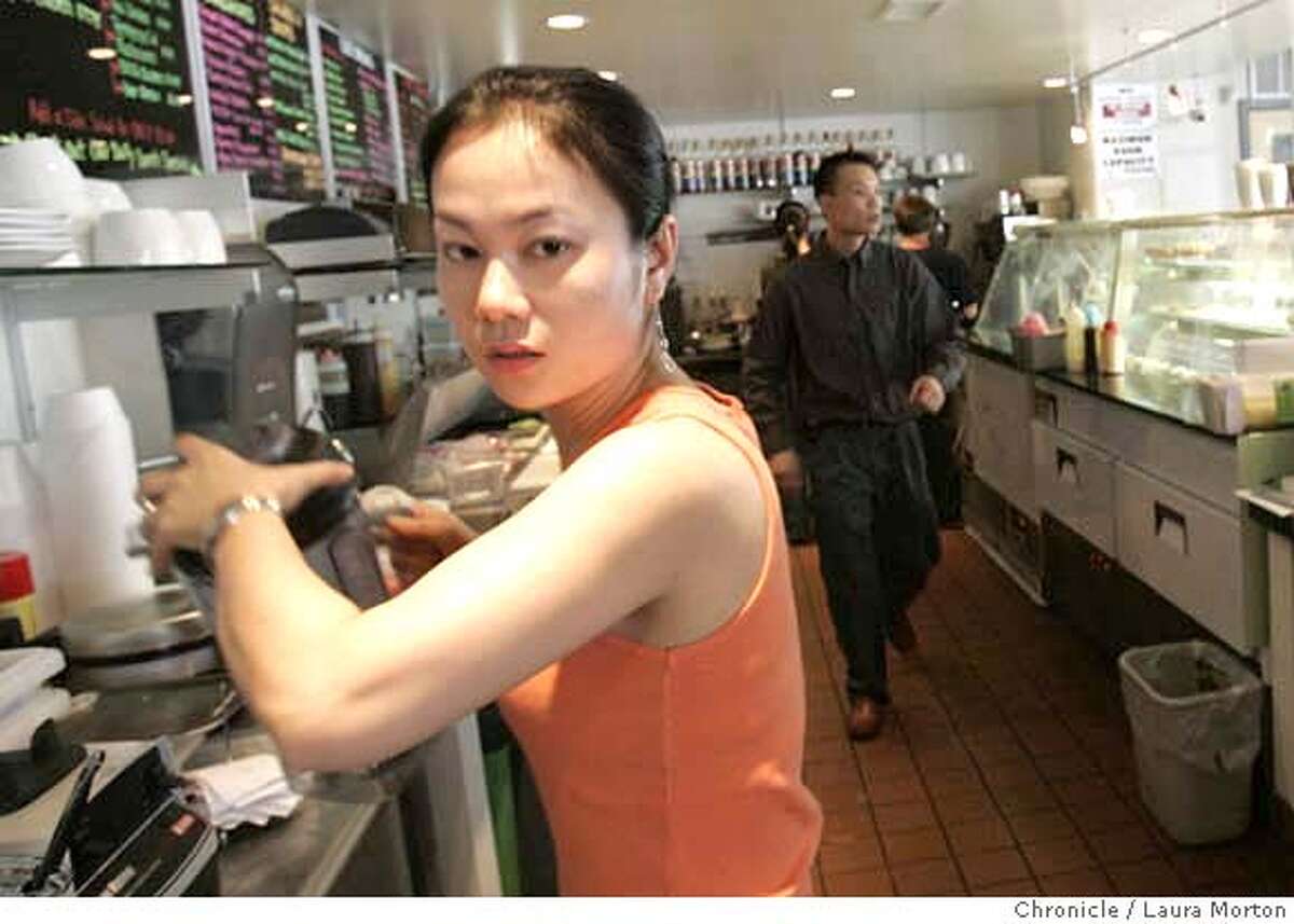 evius085217_lkm.jpg Emilie Jew (left) and Robert Jew (background) work at their restaurant Cafe Infusion, located at 829 Mission Street in San Francisco, CA. The Jew's are newlyweds, who will celebrate the one year anniversary of their restaurant on July 9. They've experienced some of the hardships that often come with opening a small business. Laura Morton/The Chronicle MANDATORY CREDIT FOR PHOTOGRAPHER AND SAN FRANCISCO CHRONICLE/ -MAGS OUT