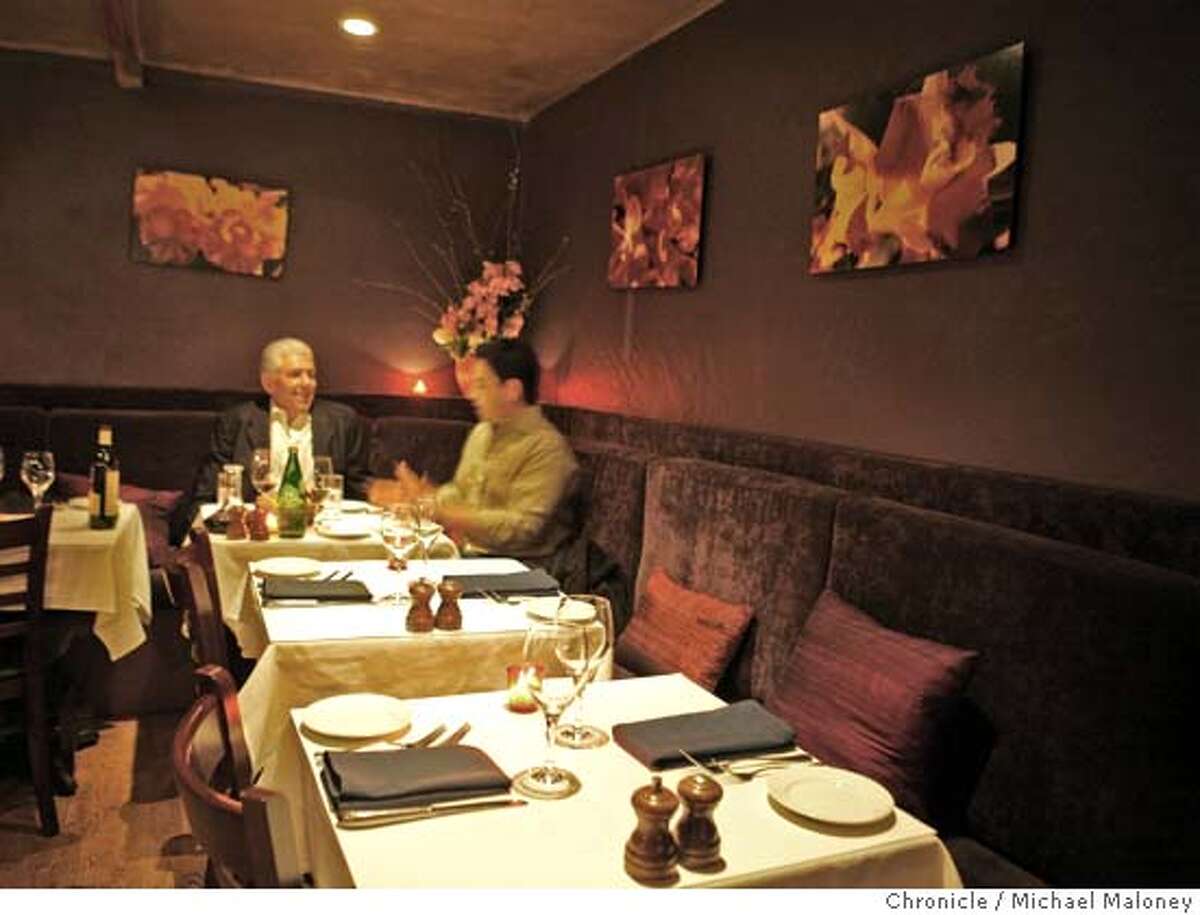 Dining in the intimate back room of Garcon is retired Senator Art Torres (left) and Gonzalo Escudero. For restaurant review of Garcon, 1101 Valencia Street. Photo by Michael Maloney / San Francisco Chronicle on 3/21/06 in San Francisco,CA