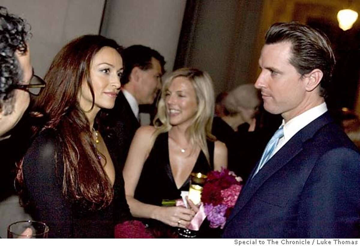 San Francisco Mayor Gavin Newsom eyes CSI:Miami actress, Sophia Milos, on the occassion of Joe Alioto-Veronese and Julie Gilman's wedding reception at City Hall on 2/19/6. Photo by Luke Thomas/Special to The Chronicle ONE TIME USE ONLY! Phone:(415) 290-1802 SanFranciscoSentinel.com