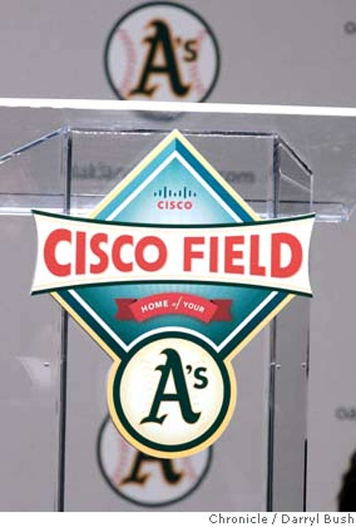 The new Cisco Field logo for the Oakland Athletics is unveiled at a press conference podium, for team to be moved to Fremont, Oakland Athletics press conference at Cisco Systems in (cq) in San Jose, CA, on Tuesday, November, 14, 2006. 11/14/06 Darryl Bush / The Chronicle ** Lew Wolf, John Chambers, Allan H. (Bud) Selig, Michael Crowley (cq) (cq)