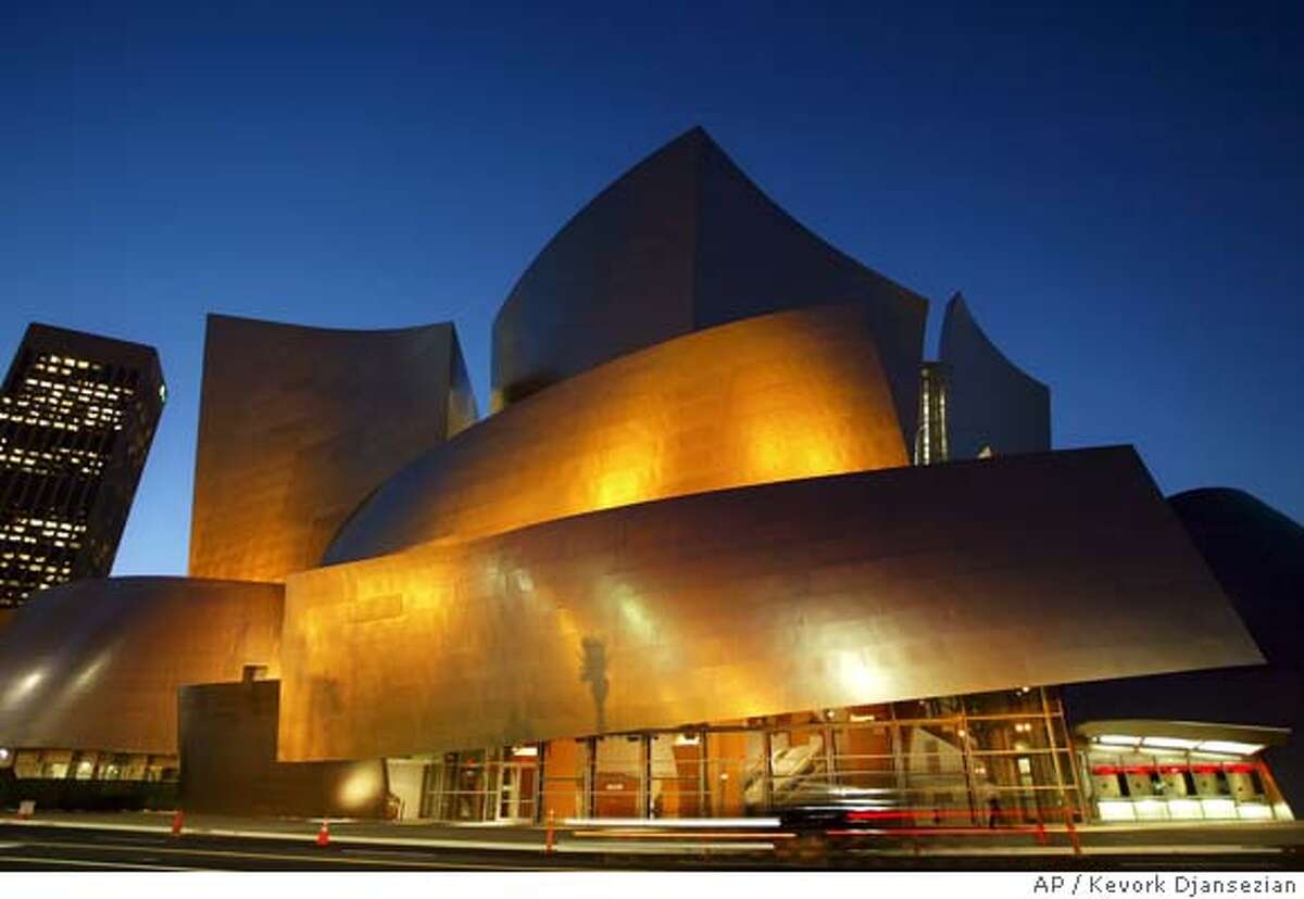 ** FOR USE ANYTIME **The new Walt Disney Concert Hall, designed by renowned architact Frank Gehry, is silhouetted against the twilight sky Tuesday evening, Oct. 14, 2003, in downtown Los Angeles. The 16-year struggle to build one of the city's most distinctive landmarks officially ends with an Oct. 23 debut concert. (AP Photo/Kevork Djansezian) CAT FOR USE ANYTIME