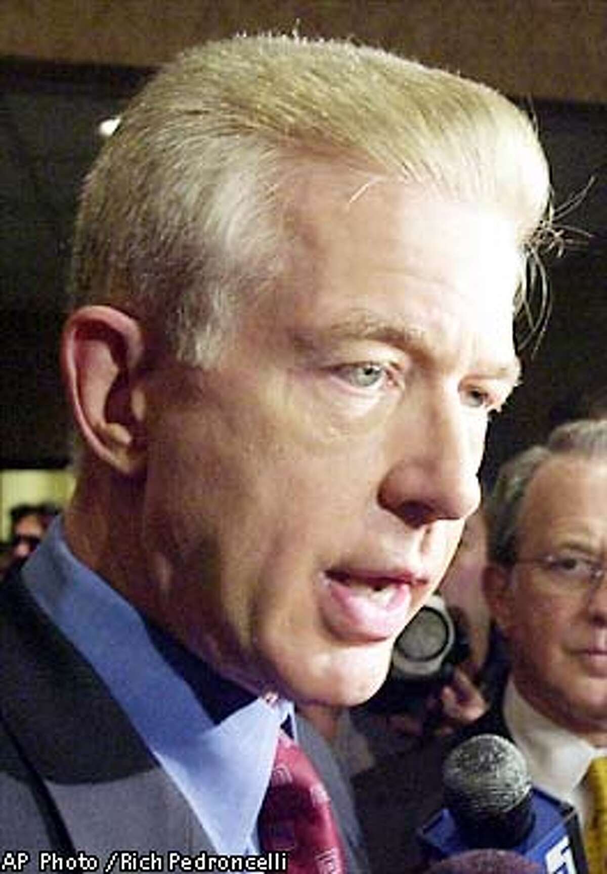 California Gov. Gray Davis told reporters that he wants to get to the bottom of the Oracle contract probe as much as anybody, following his appearance before the American Federation of State, County and Municipal Employees association, in Sacramento,Calif., Monday, May 6, 2002. A state legislative committee is to begin hearings on the Oracle software contract and several Davis administration members have been called to testify.(AP Photo/Rich Pedroncelli)