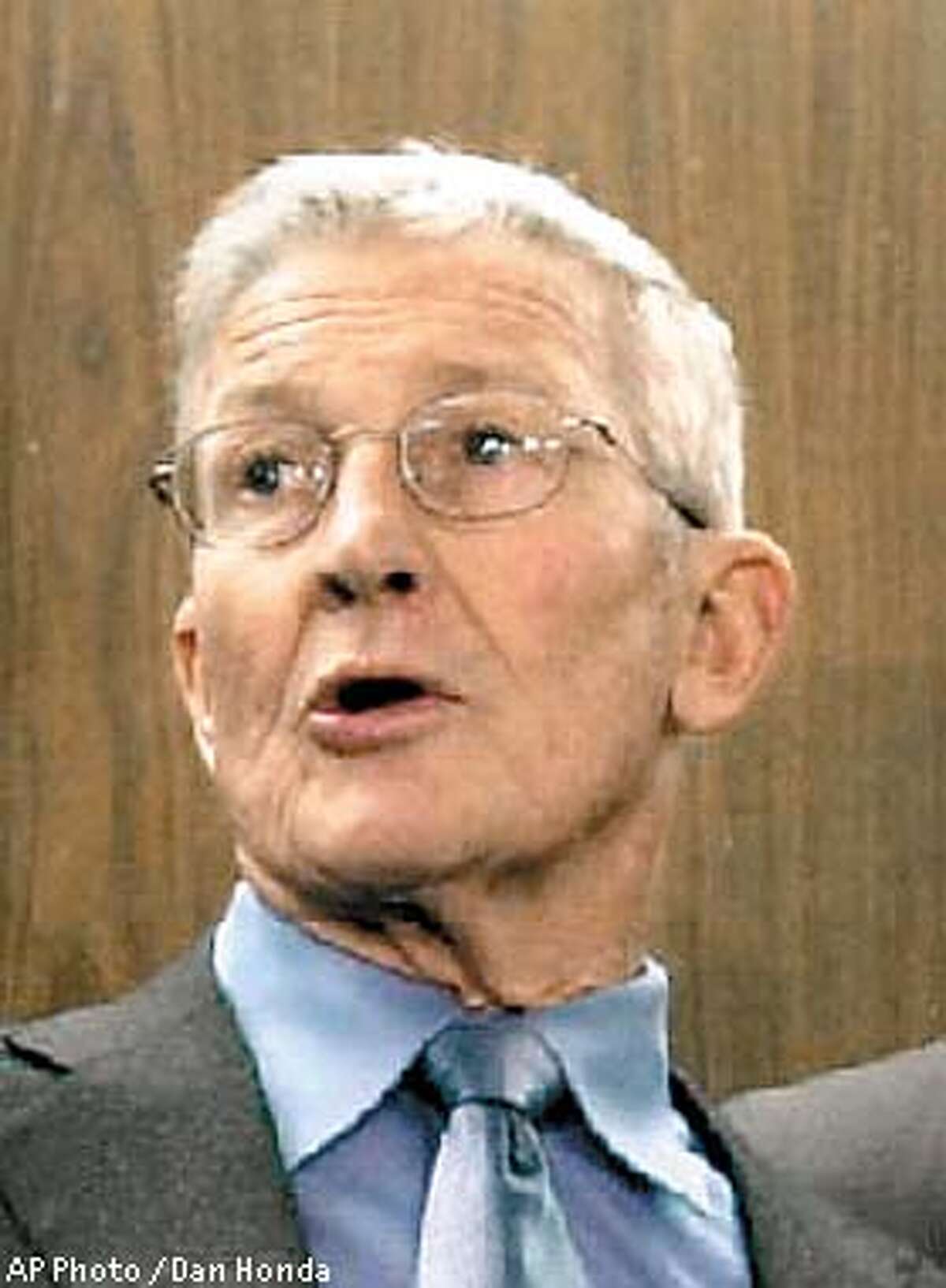 Brown tries end run around Hallinan