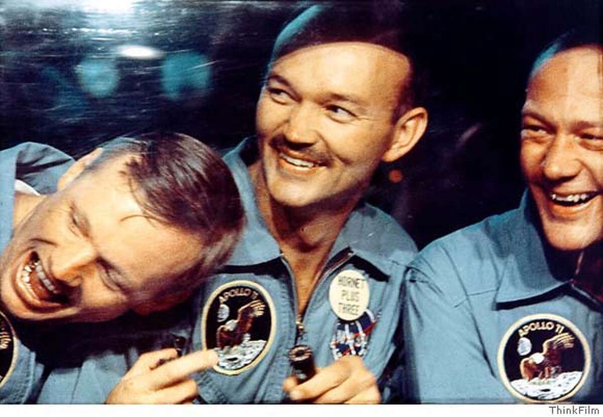 ThinkFilm provided this photo of (left to right) Neil Armstrong, Mike Collins and Buzz Aldrin after the July, 1969 Apollo 11 mission from "In the Shadow of the Moon." (AP Photo/ThinkFilm)