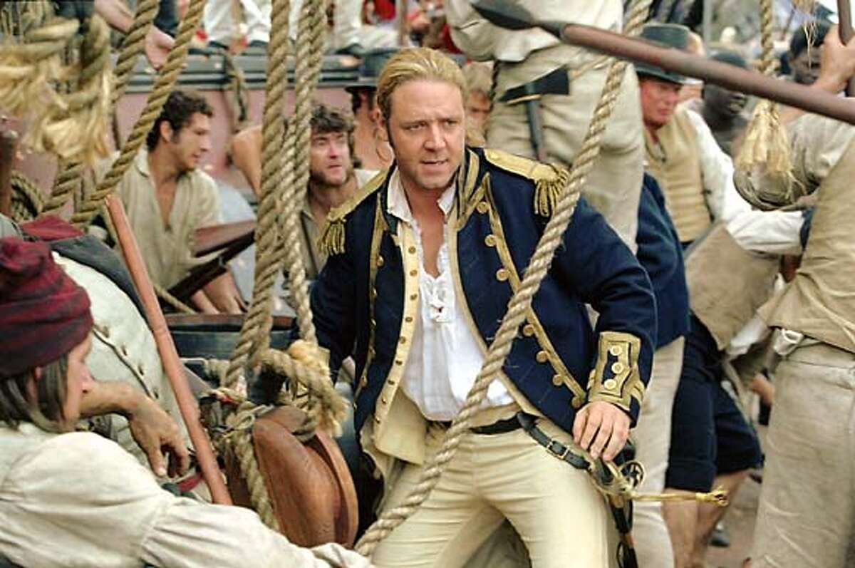 Russell Crowe portrays Capt."Lucky" Jack Aubrey who commands a British navy fighting ship in the new film "Master and Commander The Far Side of the World" in a scene from the film in this undated publicity photograph. The film opens November 14, 2003 in the United States. REUTERSStephen Vaughan/20th Century Fox/Handout 0
