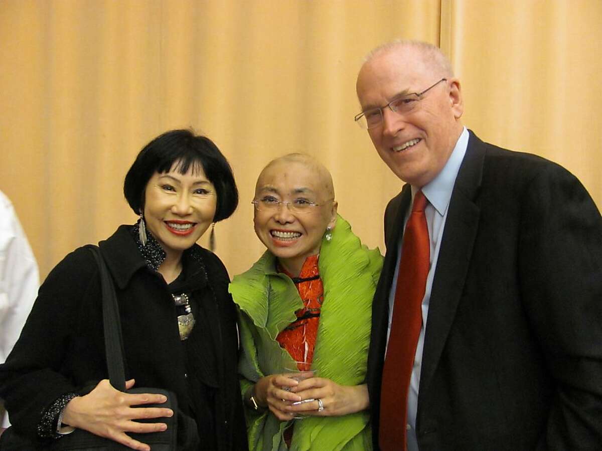 Mezzo soprano Zheng Cao, who was battling cancer, was honored Tuesday by the San Francisco Opera's Merola Opera Program with the creation of a fund to help either Asian-Pacific Islander or mezzo soprano opera students study with Merola in Feb. 2012. She is show above, center, with her husband, Dr. David Larson, and her longtime friend Amy Tan, author of "The Bonesetter's Daughter." Cao starred in the world premiere of the opera based on Tan's novel.
