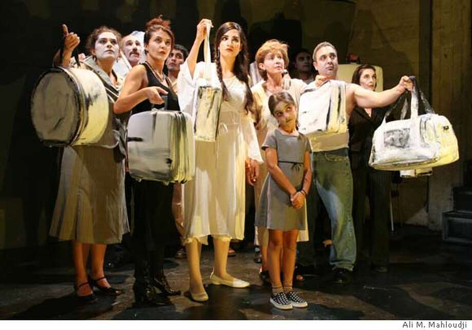 REVIEW / 'Suitcase' examines shades of immigrants' dislocation SFGate