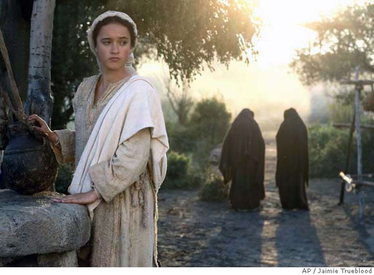 In this publicity photo released by New Line Cinema actors Keisha Castle-Hughes as Mary, left, appears in a scene from "The Nativity Story." (AP Photo/New Line Cinema, Jaimie Trueblood) PROMOTIONAL PHOTO RELEASED BY NEW LINE CINEMA.