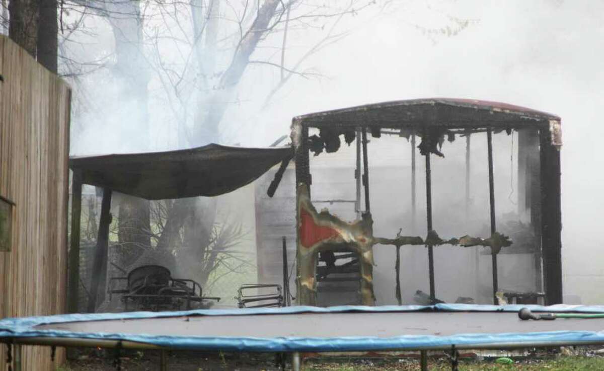 Lumberton fire destroys outbuildings