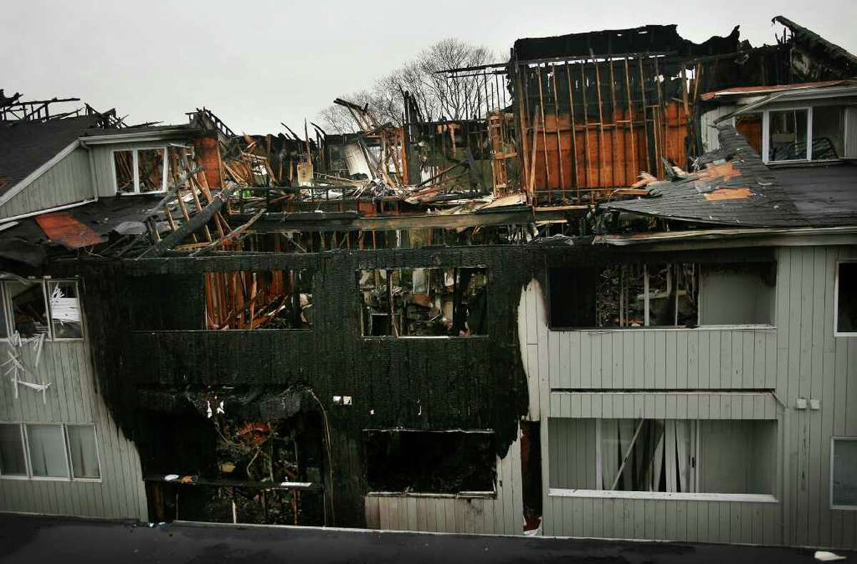 Extensive damage from an early morning fire left at least 35 people homeless at an apartment complex at 3260 Main Street in Bridgeport on Thursday, February 16, 2012.