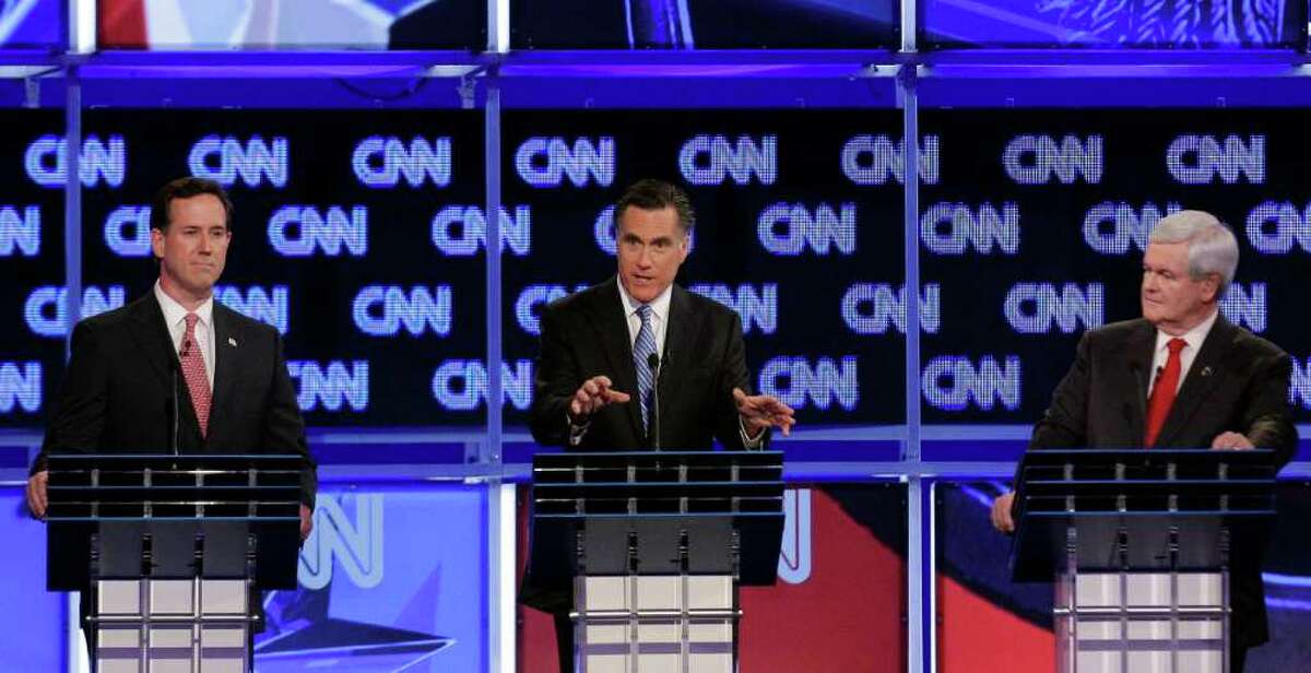 A reader contends that Republican presidential candidates, among them Rick Santorum (from left), Mitt Romney and Newt Gingrich, fell into a Democratic trap.