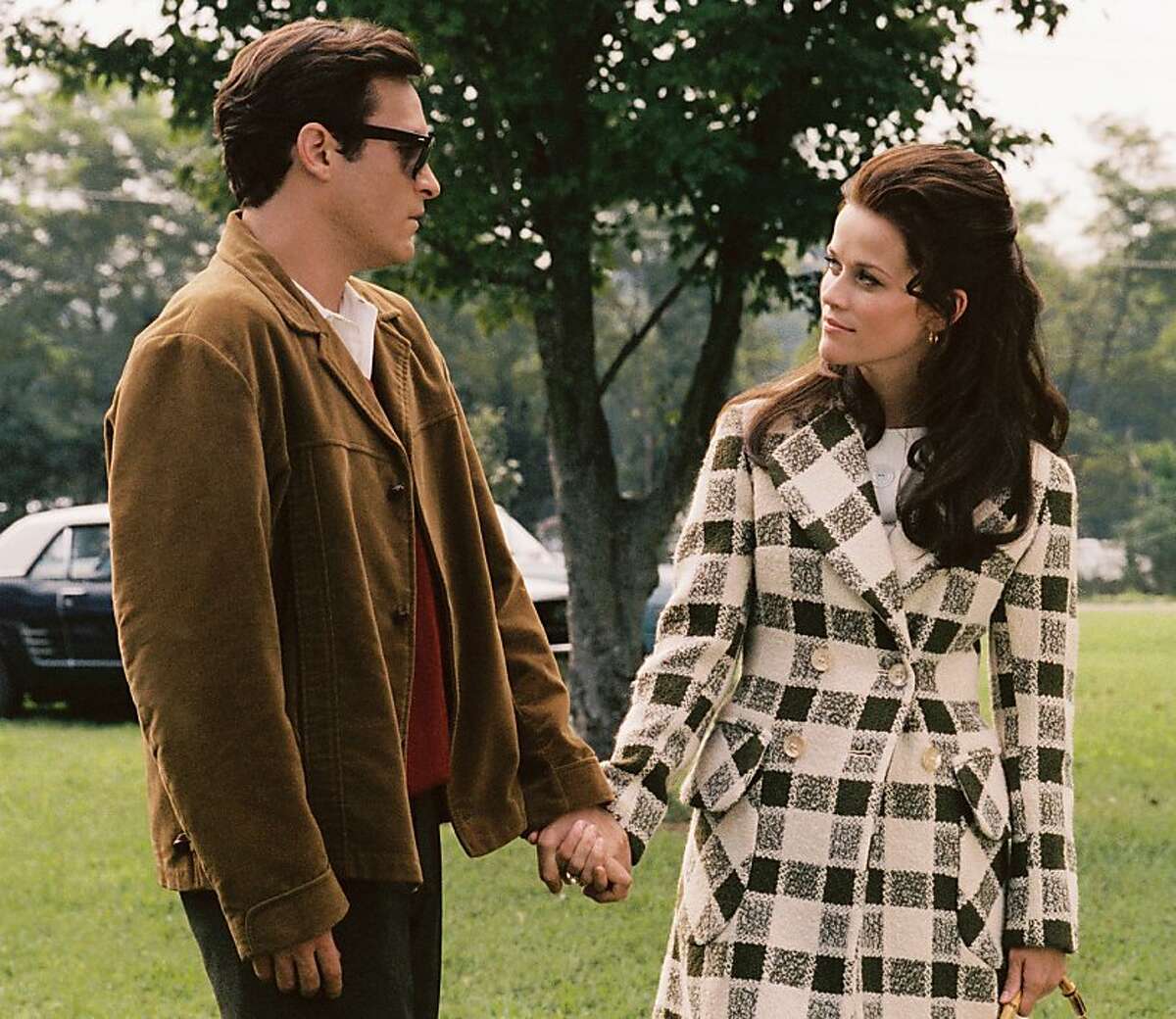 This undated publicity photo provided by Twentieth Century Fox shows actors Joaquin Phoenix, left, and Reese Witherspoon who portray Johnny Cash and June Carter in "Walk The Line." (AP Photo/Twentieth Century Fox, Suzanne Tenner)