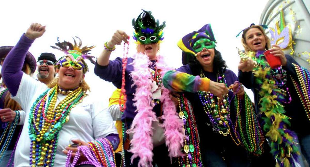 Mardi Gras goers come to 'drink, dance, eat' at 20th anniversary of