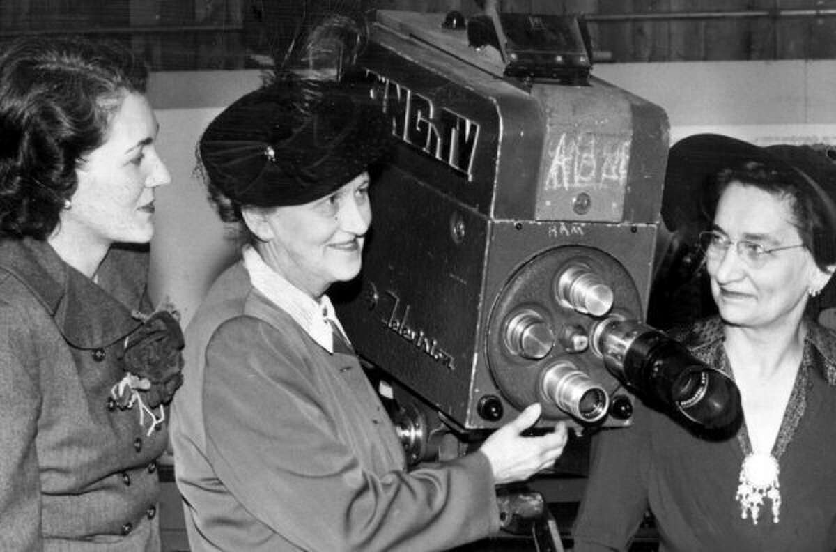 Dorothy Bullitt, the founder of King Broadcasting, shows a KING TV camera three years after the station started as KRSC-TV, more than 60 years ago.  Tegna, the company's present owner, is shutting down Northwest Cable News on January 6. (seattlepi.com file)