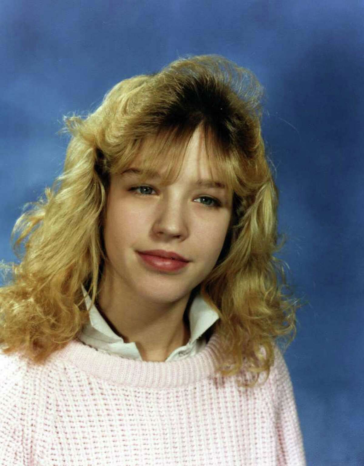 A woman, here in her 7th grade photograph, alleges that in 1990 she was drawn into a sexual relationship with Keith Raniere after he offered to tutor her in Latin and algebra.