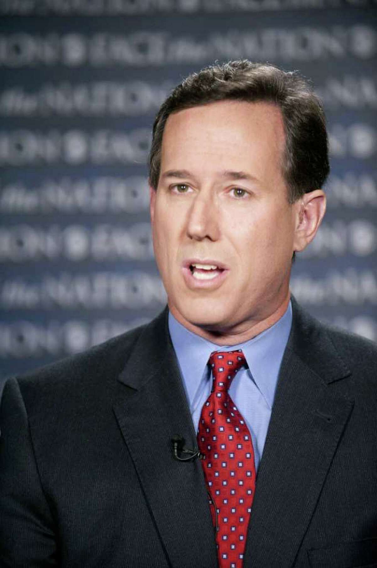 Rick Santorum said he wasn't criticizing the president's faith.
