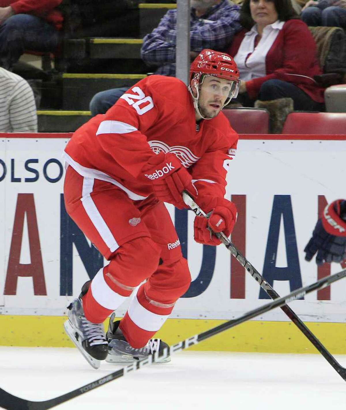 Detroit Red Wings left wing Drew Miller (20) skates during the first period of an NHL hockey game against the Columbus Blue Jackets in Detroit, Saturday, Jan. 21, 2012. (AP Photo/Carlos Osorio)