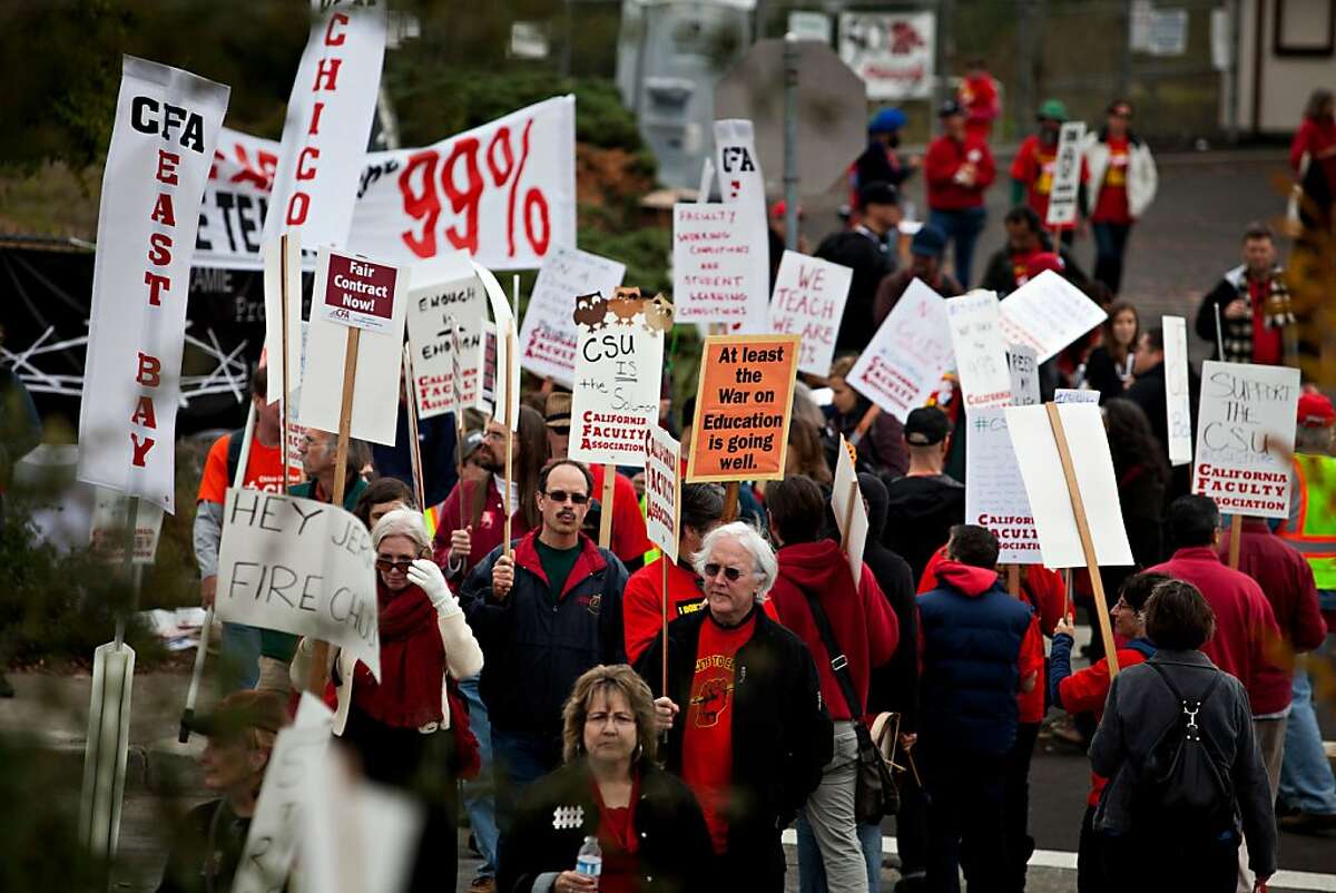 In this file photo, California State University faculty, staff and supporters picket at CSU in Hayward in 2011, as part of a strike protesting for faculty pay adjustments.
