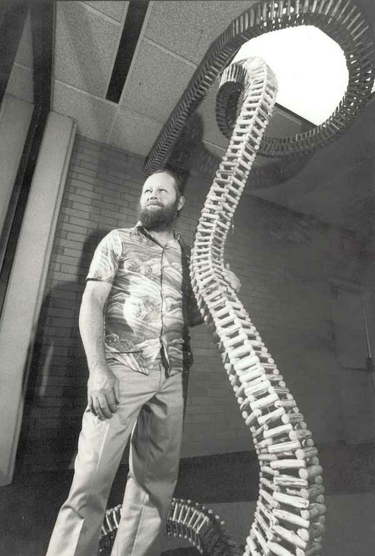 Charlie Stagg with one of his pieces that was displayed at the Jack Brooks Regional Airport in 1987. Enterprise file photo