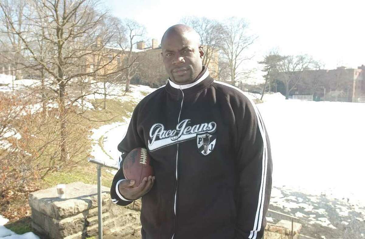 Greenwich police officer Donnell Fludd, pictured in 2006, was arrested Monday after the department received a complaint from a female town resident regarding his behavior. Fludd was charged with second-degree stalking, second-degree harassment and disorderly conduct, all of which are misdemeanors. Fludd is one of the co-founders of the department's flag football league. Photo: Mel Greer, GT
