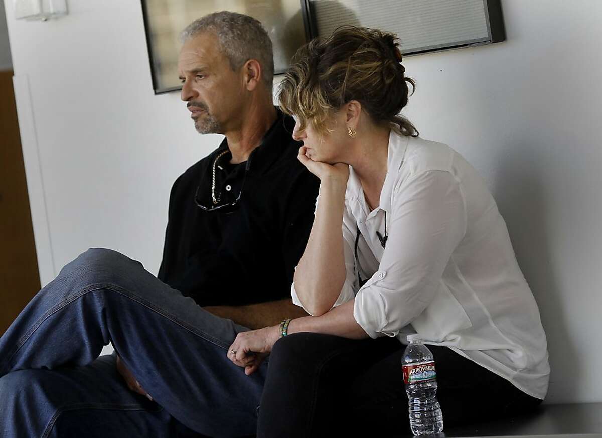 The parents of Daniel DeWitt, Candy (right) and Al DeWitt waited for court proceedings to begin. Berkeley hills slaying suspect Daniel Jordan DeWitt was arraigned Wednesday February 22, 2012 for the bludgeoning of Peter Cukor in an Oakland, Calif. courtroom.