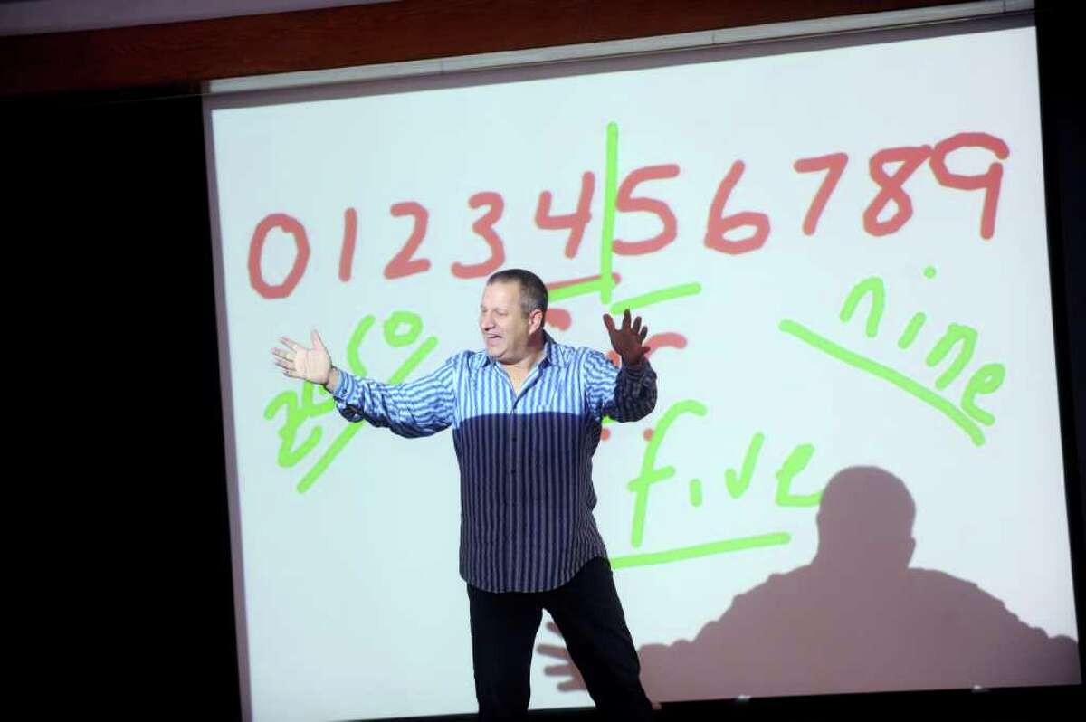 "Human Calculator" Scott Flansburg entertains students with a talk on mathematics at Greenwich Academy students Thursday, Feb. 23, 2012.