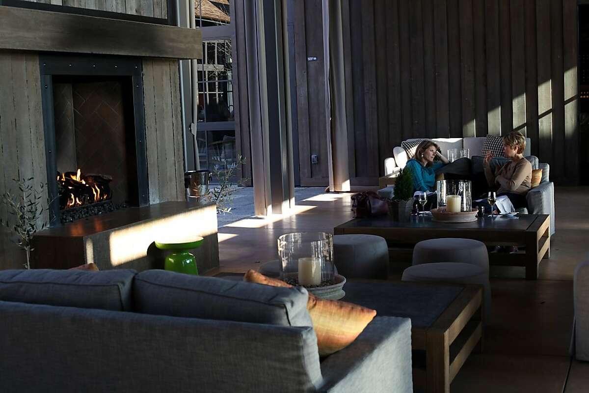 People enjoy lunch in front of a warm fireplace at the Ram's Gate Winery, Thursday January 5, 2012, in Sonoma, Calif.