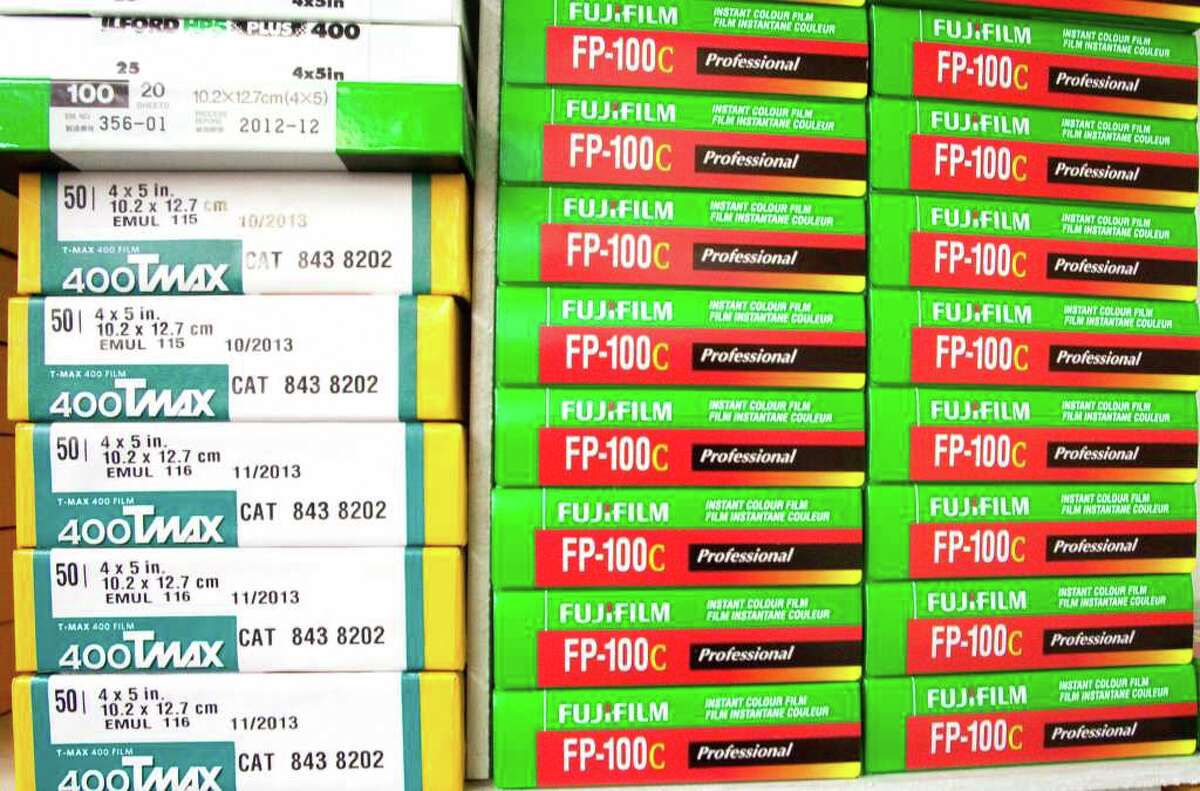 Camera, tech stores survive through service