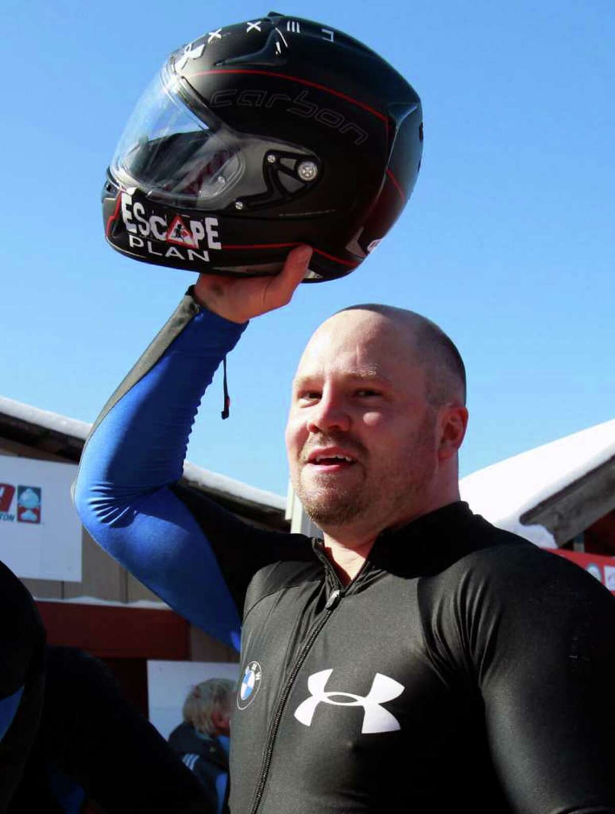 United States pilot Steven Holcomb reacts after his team won the men's four-man bobsled world championships in Lake Placid, N.Y., Sunday, Feb. 26, 2012. (AP Photo/Mike Groll)