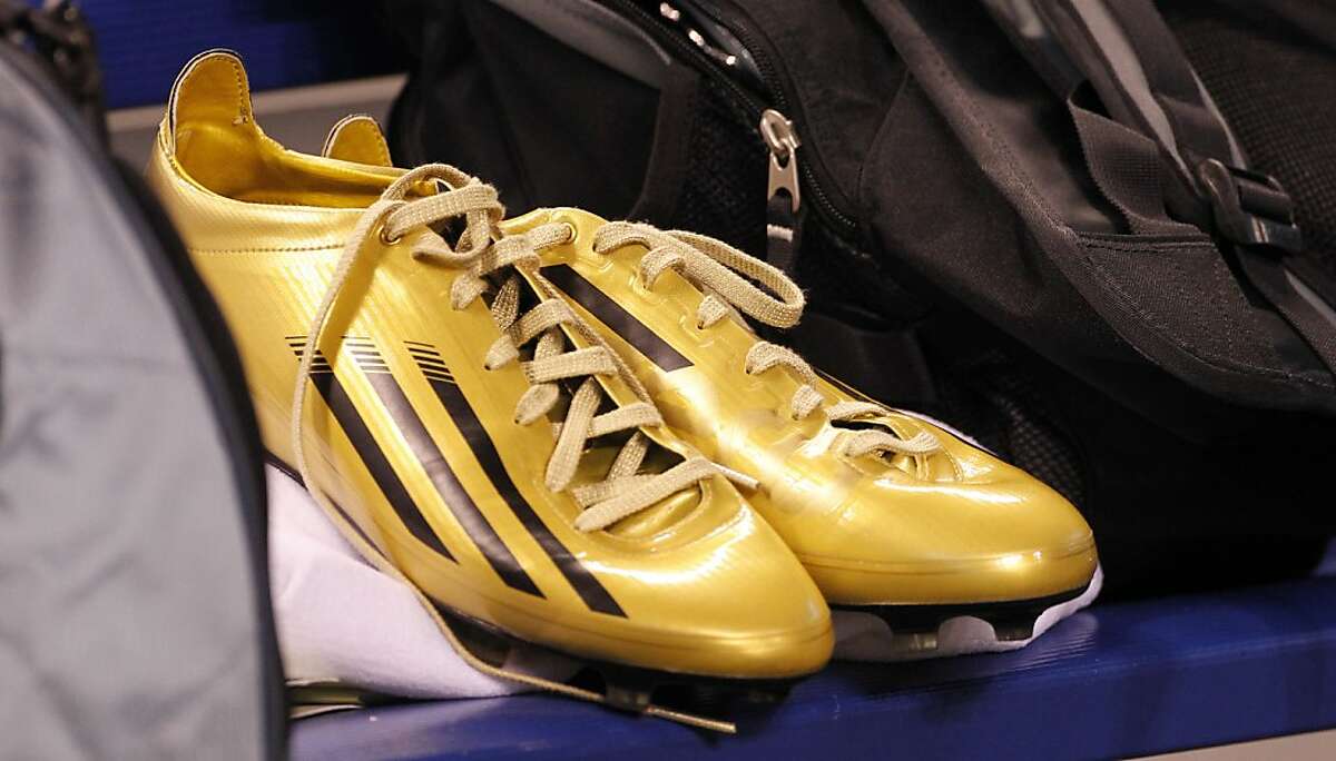 These are the new shoes that Baylor quarterback Robert Griffin III wore at the NFL football scouting combine in Indianapolis on Sunday, Feb. 26, 2012. (AP Photo/Dave Martin)