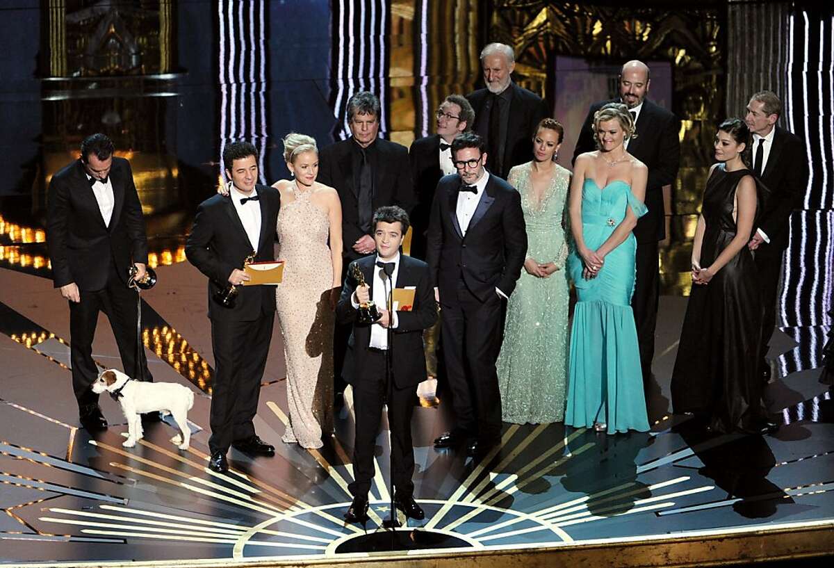 HOLLYWOOD, CA - FEBRUARY 26: Producer Thomas Langmann accepts the Best Picture Award for 'The Artist' as he is onstage with members of the cast and crew during the 84th Annual Academy Awards held at the Hollywood & Highland Center on February 26, 2012 in Hollywood, California. (Photo by Kevin Winter/Getty Images)