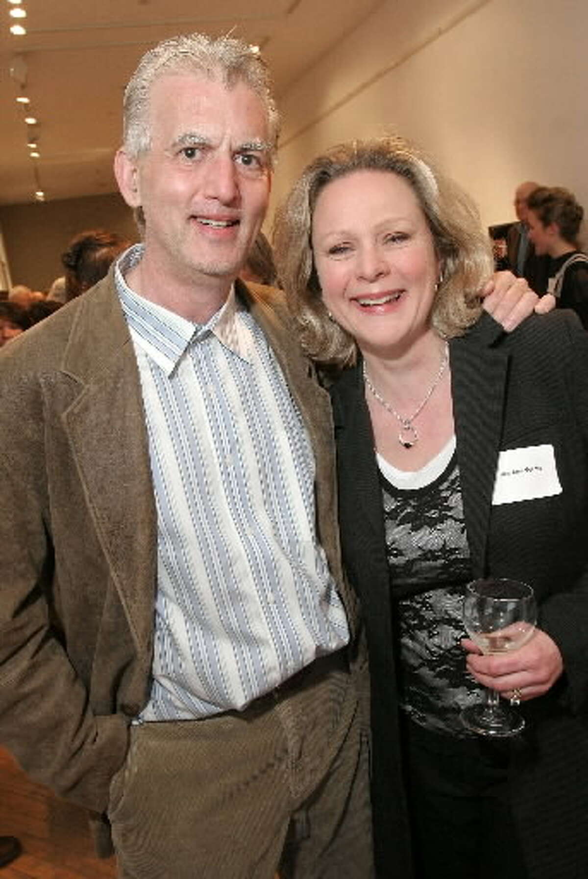 (Photo by Joe Putrock/Special to the Times Union) - PYX 106 radio personality, Bob 'the Wolf' Wolf(left), and his wife Dee Ann Veeder(right), at the Hudson Opera house during the cocktail hour preceeding dinner during the Movable Feast. While Wolf said with a wink that it was his girlfriend and that he had left his wife home, Veeder assured otherwise. Joe Putrock