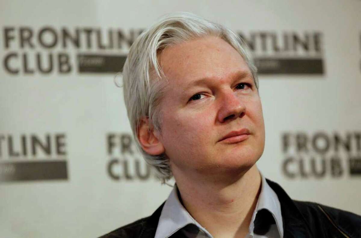 Julian Assange, founder of WikiLeaks listens at a press conference in London, Monday, Feb. 27, 2012. WikiLeaks said on Monday that it was publishing a massive trove of leaked emails from U.S. intelligence analysis firm Stratfor, shedding light on the inner workings of the Texas-based think tank.