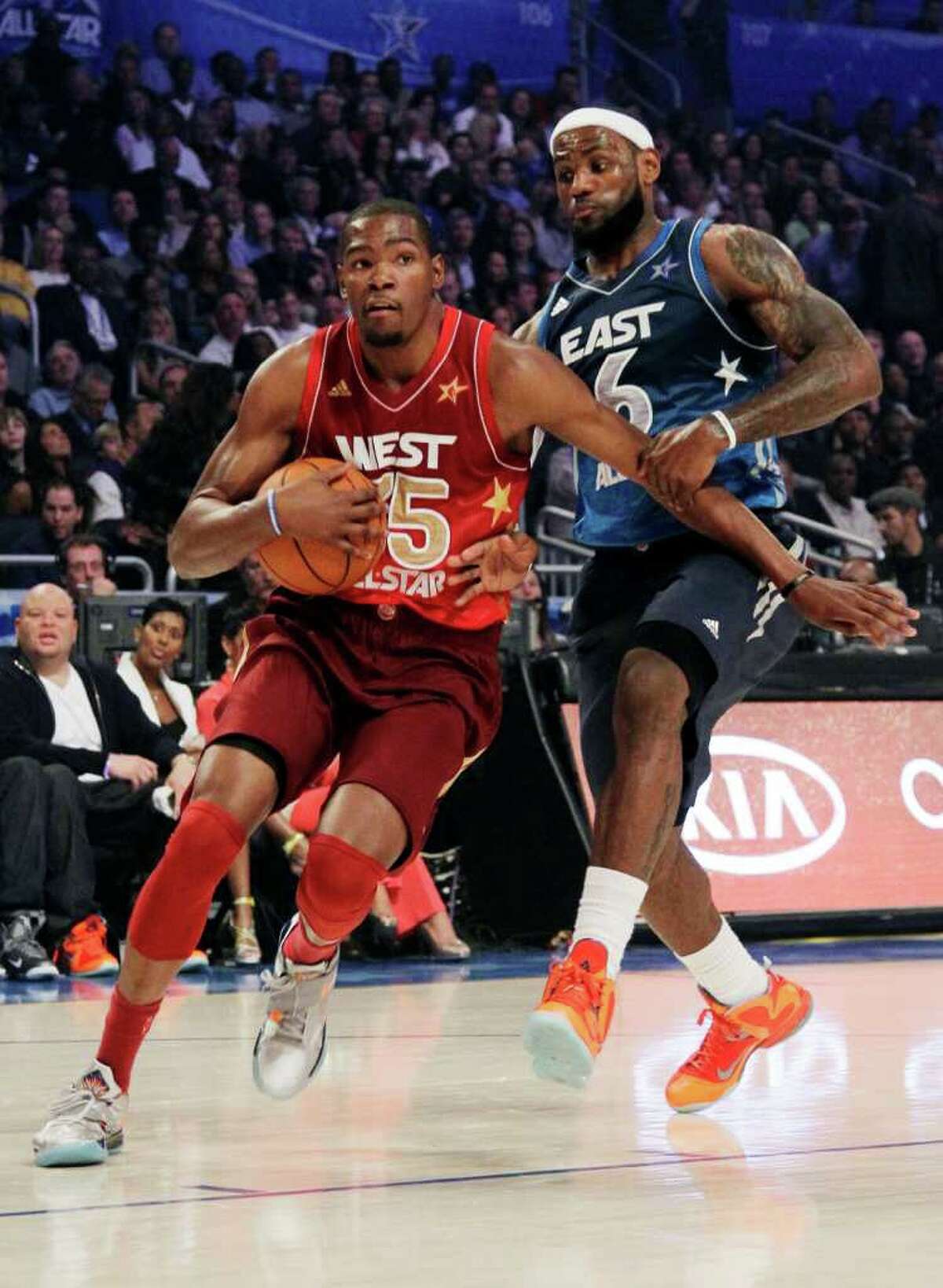 Eastern Conference's LeBron James (6), of the Miami Heat, pressures Western Conference's Kevin Durant (35), of the Oklahoma City Thunder, during the NBA All-Star basketball game, Sunday, Feb. 26, 2012, in Orlando, Fla.