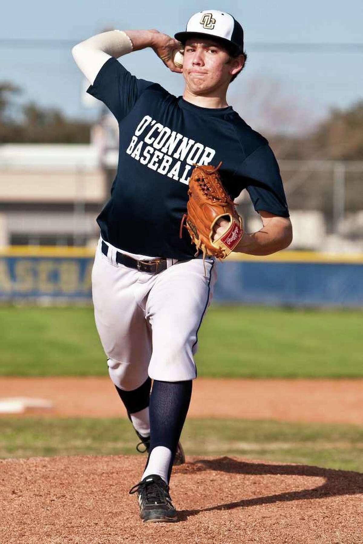 O'Connor's Mark Ecker throws from the mound during a practice session at the School on Feb. 22, 2012. Ecker struck out 16 batters and threw a one-hitter in the Panther's 2-0 victory over Holmes in the season opener a day earlier. Photo by Marvin Pfeiffer / Prime Time Newspapers