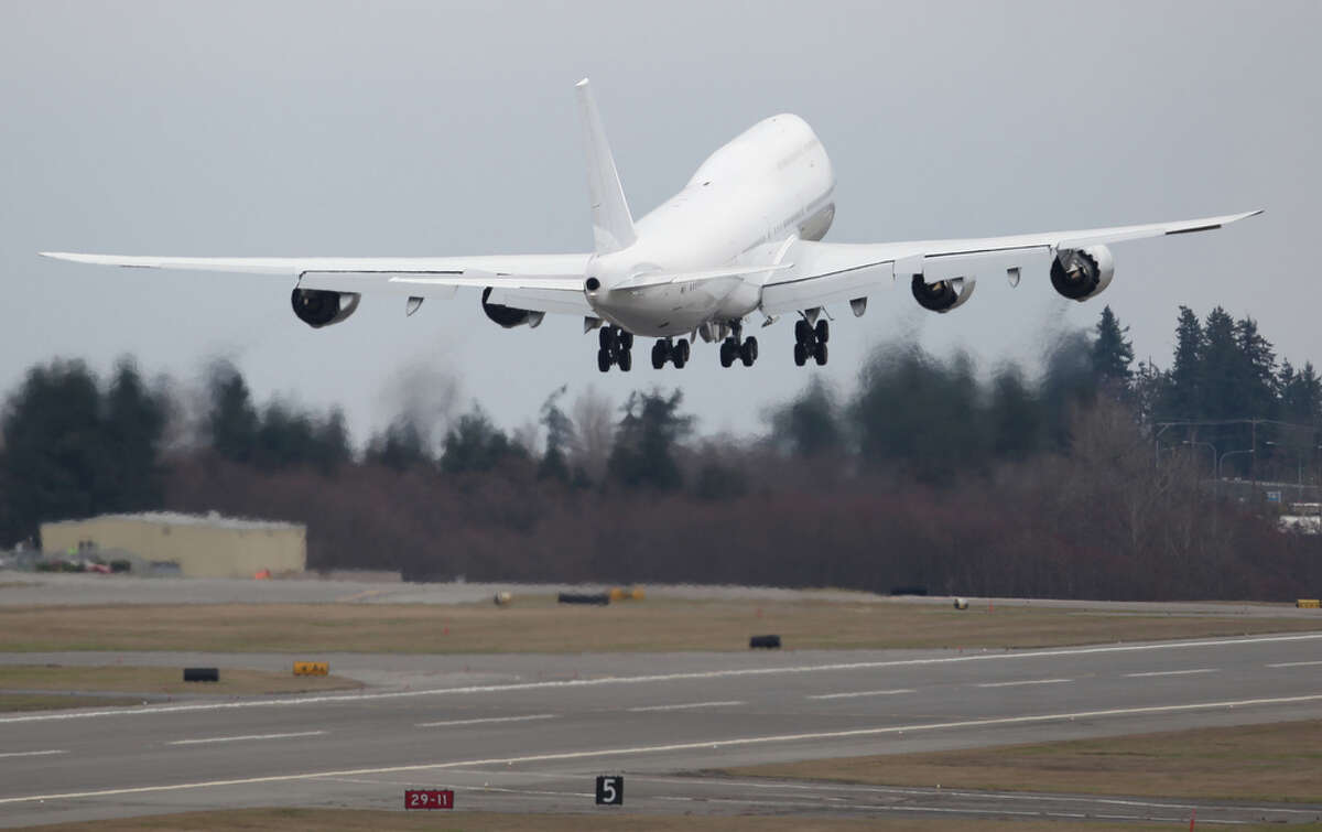 The first delivered 747-8 Intercontinental VIP airplane takes off from Paine Field on Tuesday, February 28, 2012. The first 747-8I was delivered Tuesday to an undisclosed customer.