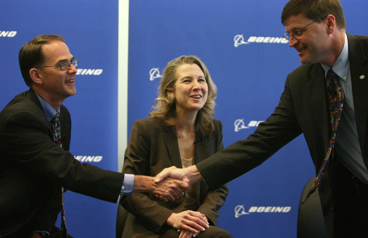 From left, Bruce Dickinson, VP and chief project engineer for the 747-8, Elizabeth Lund, VP and program manager of the 747 program, and Capt. Steve Taylor, president of Boeing Business Jets speak during a press conference on Tuesday, February 28, 2012 at the Future of Flight in Mukilteo. The first 747-8 Intercontinental VIP airplane was delivered Tuesday to an undisclosed customer.