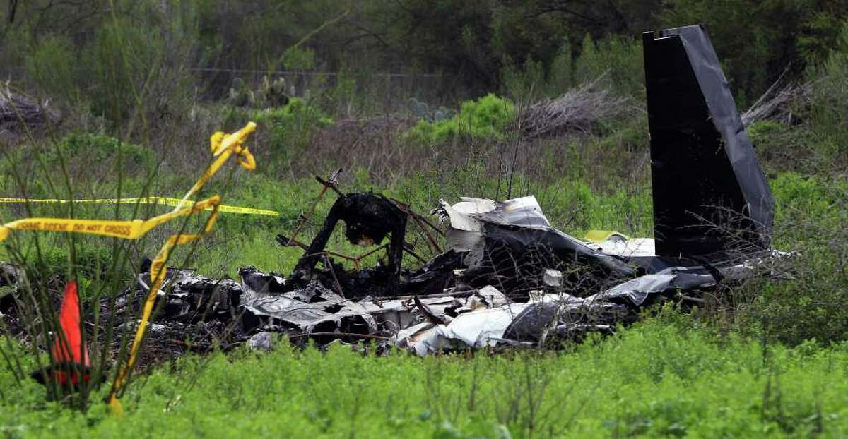 This is the crash site of a Mooney M20 aircraft that exploded on brushy property owned by the San Antonio Water System in the 1900 block of Rilling Road around 5:10 p.m. last Sunday February 26, 2012. The plane took off from Stinson Municipal Airport and was bound for Fredericksburg and then turned back toward the airport after departing. The crash killed both men on board.