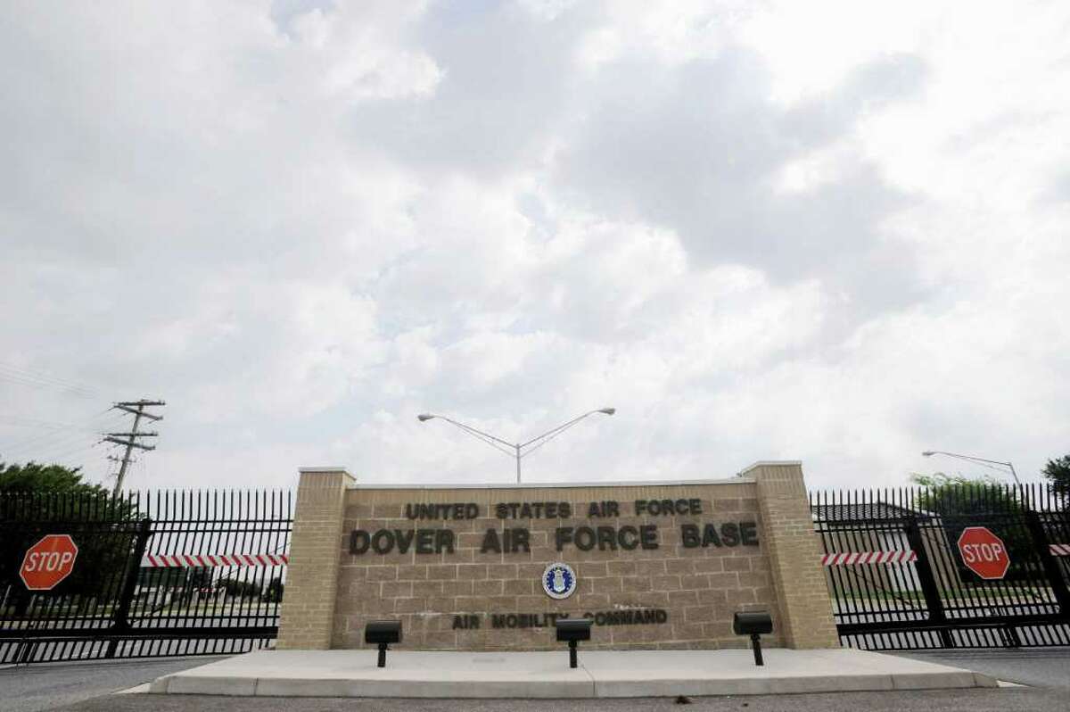 FILE - This Aug. 9, 2011, shows the closed gates at Dover Air Force Base, Del. The Pentagon revealed on Tuesday that some partial, incinerated remains of 9/11 victims that could not be identified were sent to a landfill.