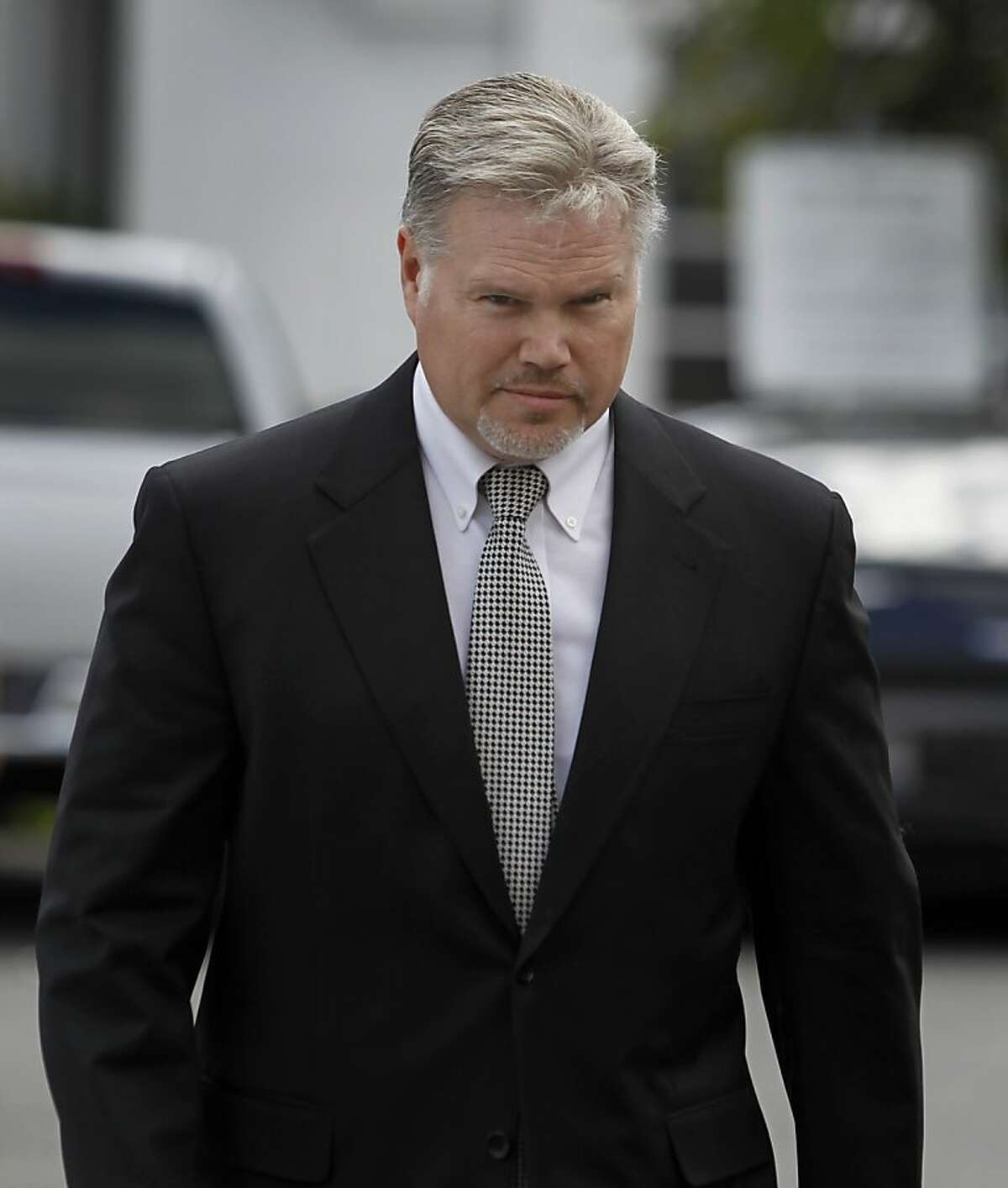 Private investigator Christopher Butler arrives for a hearing at Contra Costa County Superior Court in Walnut Creek, Calif. on Thursday, April 21, 2011. Prosecutors allege that Butler resold illegal drugs that were stolen from evidence lockers by Norman Wielsch.