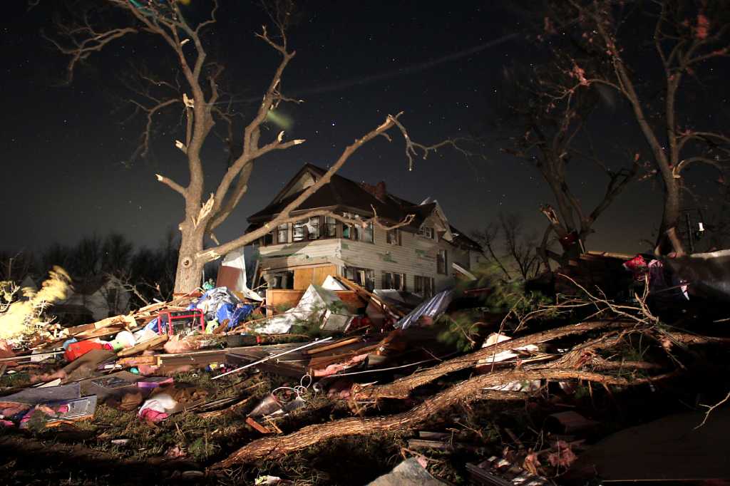 News of the world in photos: Deadly storms rake Midwest