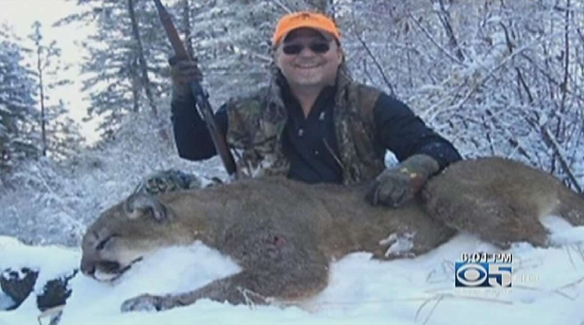 California Fish and Game Commission President Daniel Richards said Tuesday that there is "zero chance" he will resign over a photograph showing him grinning as he holds up the body of a mountain lion he shot, killed and ate in Idaho recently.