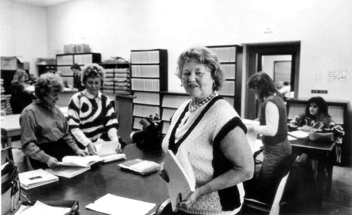 March 5, 1987: Town Clerk Lois PontBriant, foreground, said that her staff handled a 43 percent rise in deed transactions over the previous three years. "The action is here, the building is here in Stamford," said PontBriant, who predicted that her department would record about 33,000 deed transactions in 1987. "But we are feeling the effect."