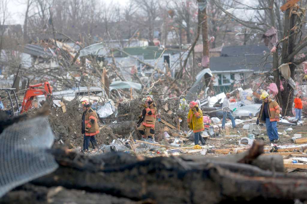 Twisters flatten towns, killing 9