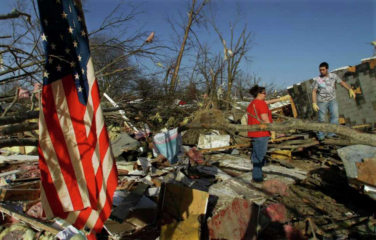 News of the world in photos: Aftermath of killer storms