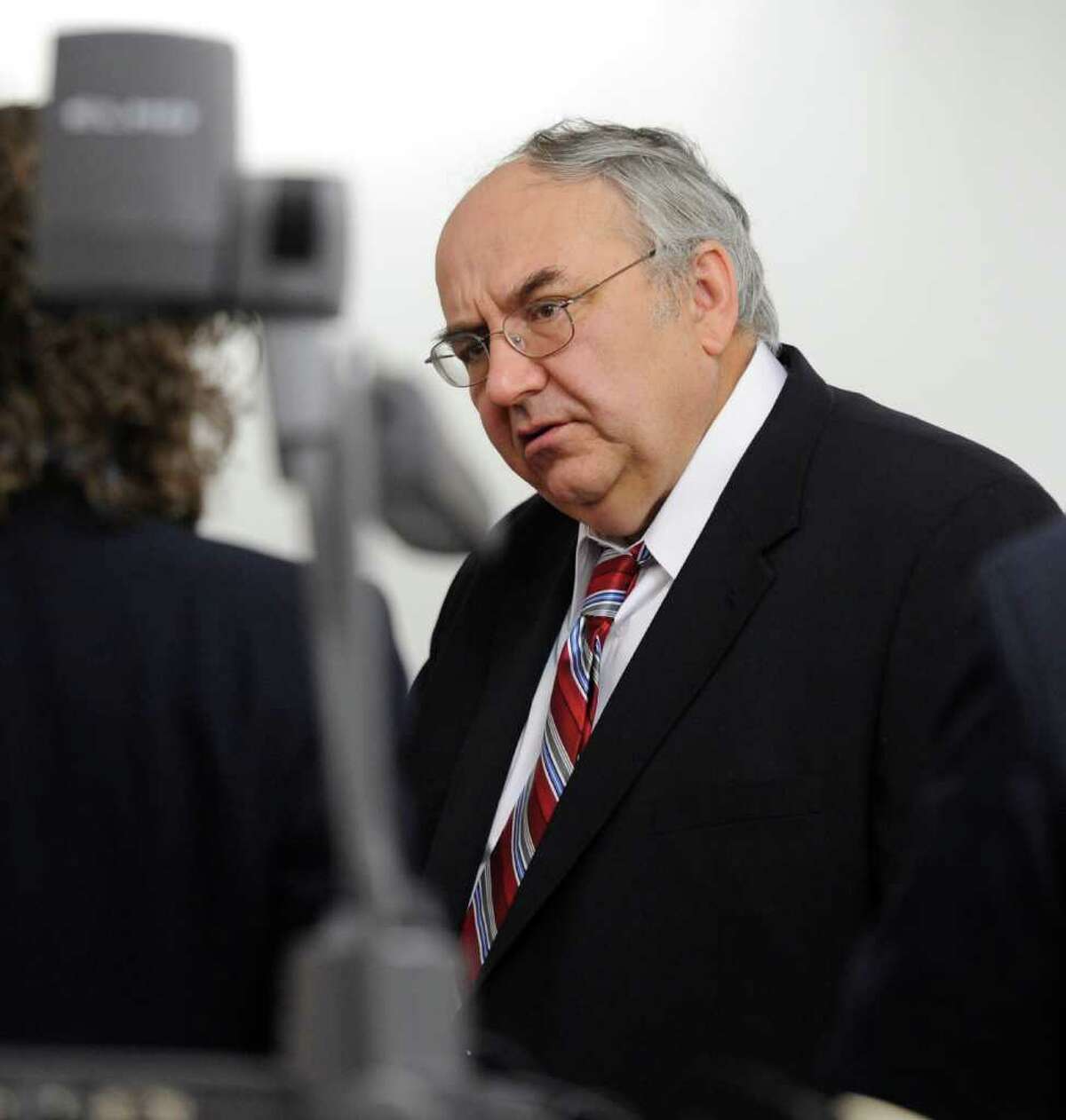 Dr. Michael Sikirica, Rensselaer County chief medical examiner, appears in Washington County Court in Fort Edward, N.Y., March 1, 2012, to testify in the Matthew Slocum murder trial. Because Sikirica is not vaccinated against coronavirus, he will not be able to conduct autopsies at Albany Med for the county. (Skip Dickstein / Times Union)