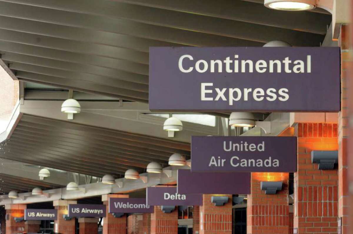 Continental signage in front of the airport will be changed to United at the Albany International Airport in Colonie , N.Y. Thursday March 1, 2012.( Michael P. Farrell/Times Union)
