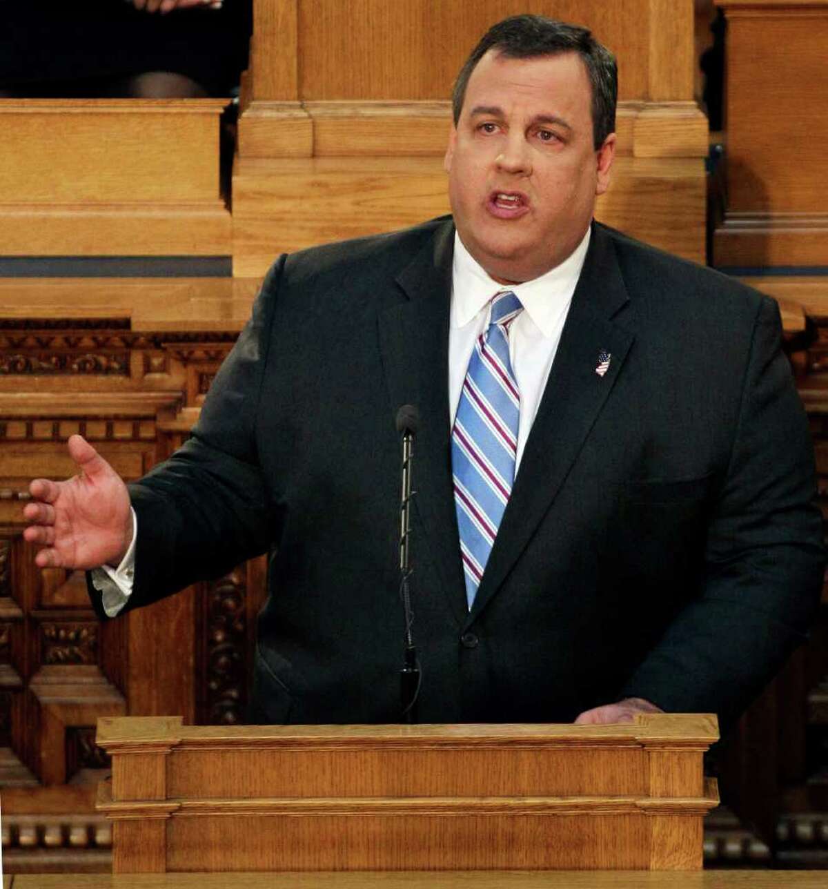 FILE - In this Feb. 21, 2012 file photo, New Jersey Gov. Chris Christie delivers his budget address in Trenton, N.J. Civil rights groups in the Northeast pressed Thursday, March 1, 2012, for an investigation of the New York Police Department's secret surveillance of Muslims in the region, a day after New Jersey Gov. Chris Christie assailed the agency for having a ?“masters of the universe?” mentality and acting either out of arrogance or paranoia.(AP Photo/Mel Evans, File)