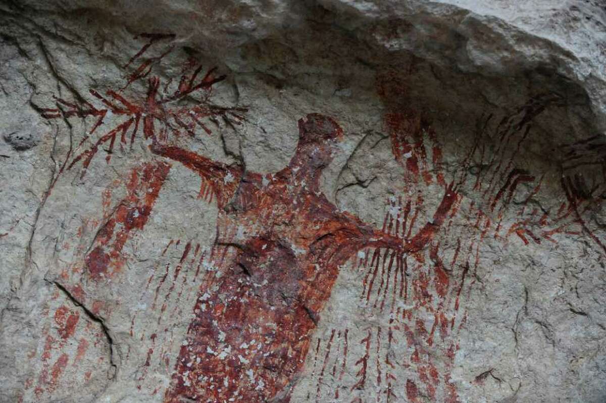 This is a detail of a portion of the mural at the Panther Cave site in Seminole Canyon along the Rio Grande and Lake Amistad. The prehistoric pictographs date back as far as 4,000 years ago. on Feb. 22, 2012. Billy Calzada / San Antonio Express-News